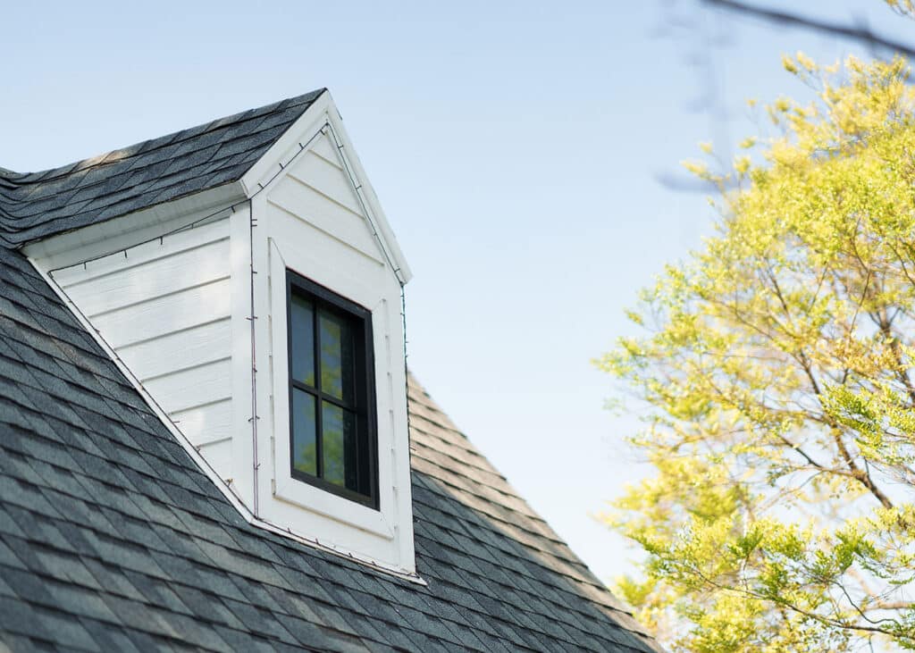 Dormers extend just beyond the pitched roof and can add depth and dimension to a home.